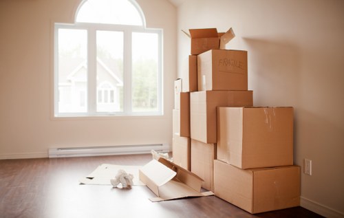Prepared sofa and table items wrapped for safe storage in Kensington