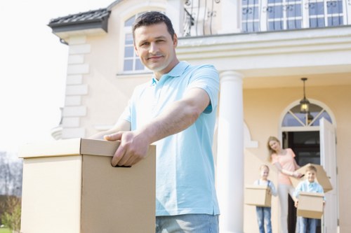 Professional movers handling office equipment during a Kensington relocation