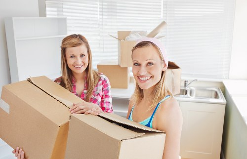Careful packing of fragile items for house removals in Kensington